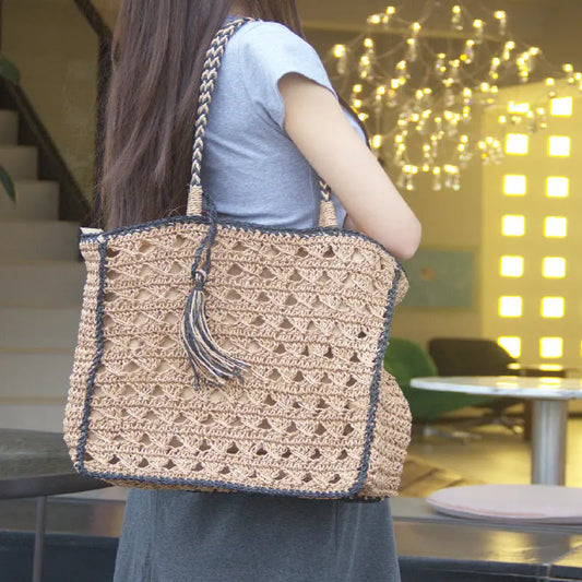 Square tassel single shoulder grass woven bag small fresh hollow handmade grass woven bag women's beach bag eprolo