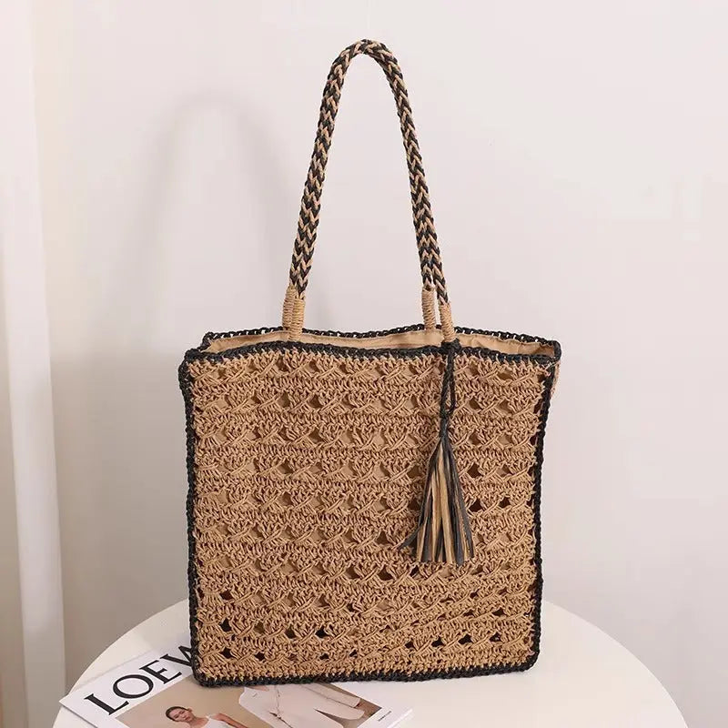Square tassel single shoulder grass woven bag small fresh hollow handmade grass woven bag women's beach bag eprolo