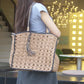 Square tassel single shoulder grass woven bag small fresh hollow handmade grass woven bag women's beach bag eprolo